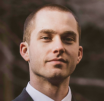Portrait of Thomas Whitfield, a trading analyst and crypto market expert